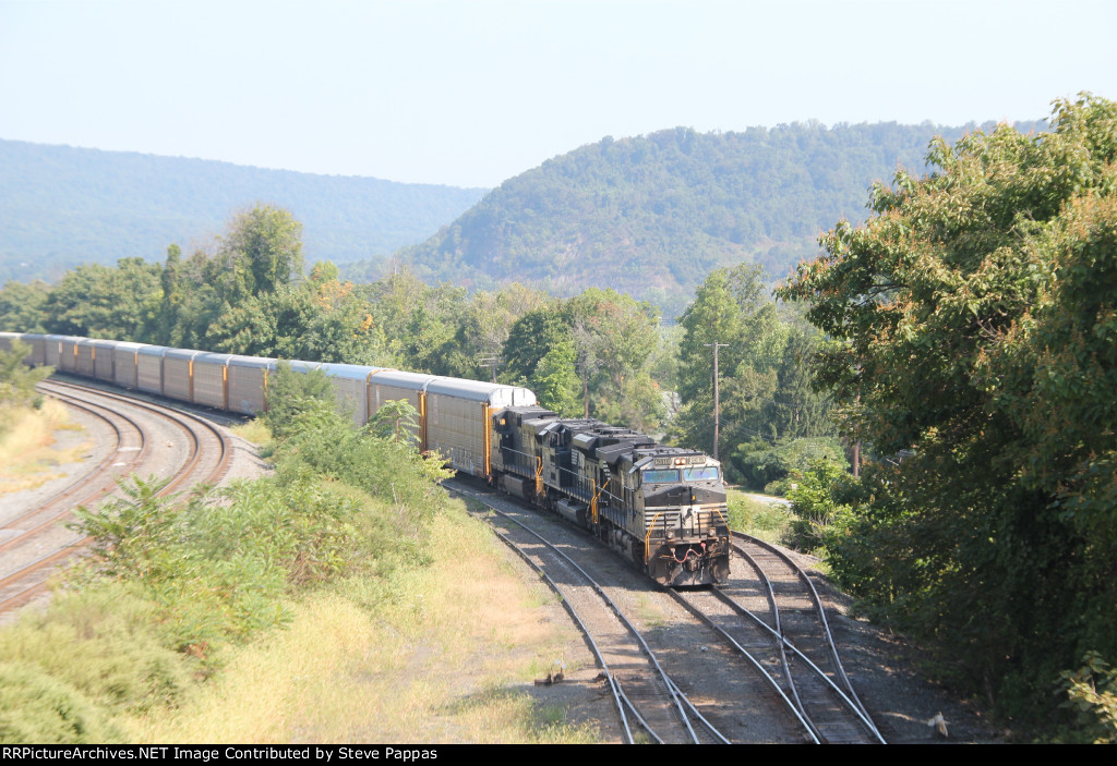 NS 9816 leads train 11J on D track into Enola yard